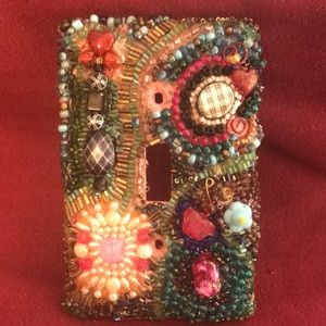 Handmade single light plate switch cover.